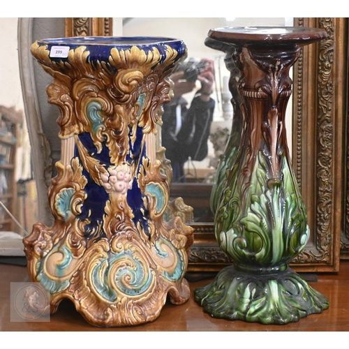 399 - Two majolica jardiniere stands, 54/56 cm high taller one repaired