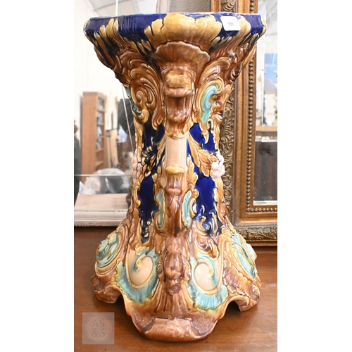 399 - Two majolica jardiniere stands, 54/56 cm high taller one repaired