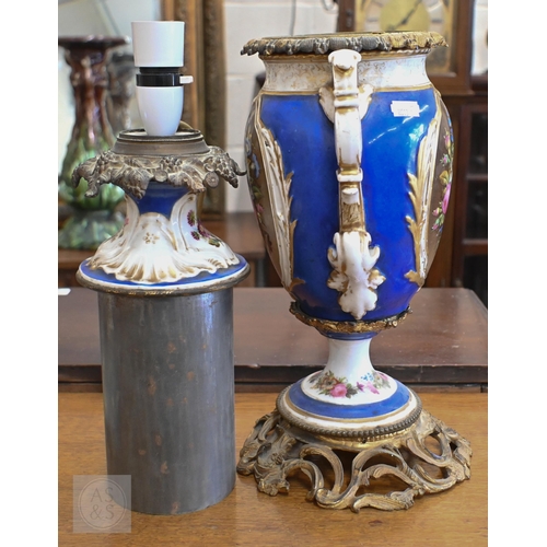 400 - A 19th century Continental porcelain lamp-base with gilt metal mounts and floral painted reserves, 4... 