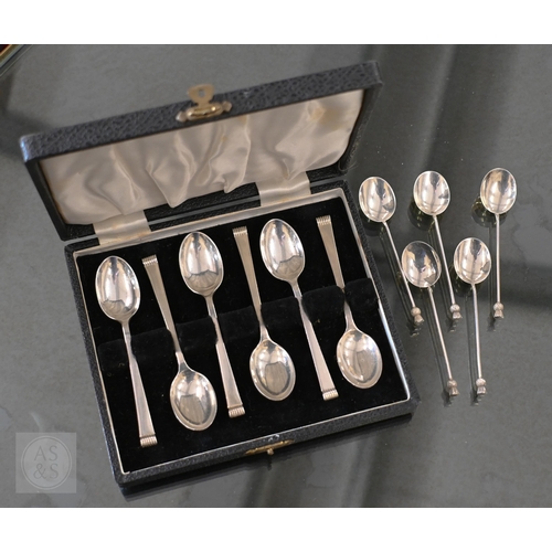 420A - A cased set of six silver teaspoons, Sheffield 1958, to/w five coffee spoons with thistle finials, B... 