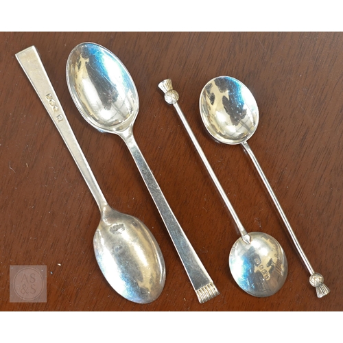 420A - A cased set of six silver teaspoons, Sheffield 1958, to/w five coffee spoons with thistle finials, B... 