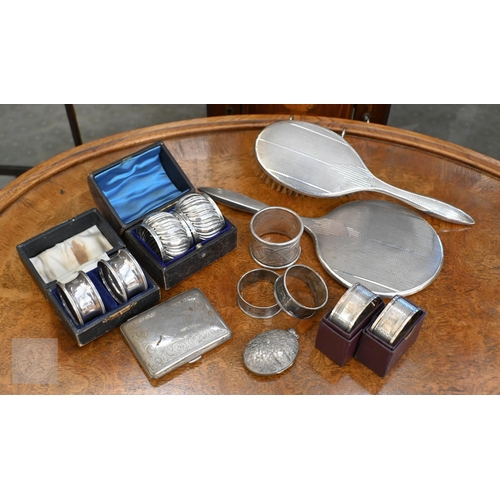 421 - Three boxed pairs of silver napkin rings and two loose examples, 3.5 oz total weight to/w a silver-b... 