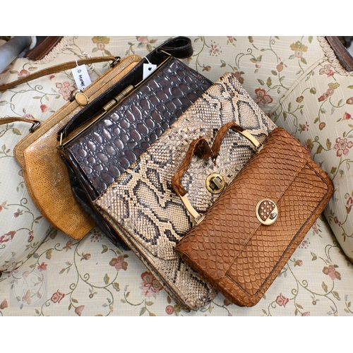 450 - Ten various ladies handbags including crocodile and snakeskin examples to/w two picnic sets in vinyl... 