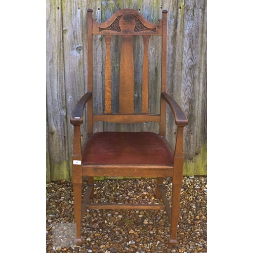 46 - Early 20th century Arts & Crafts carved oak elbow chair