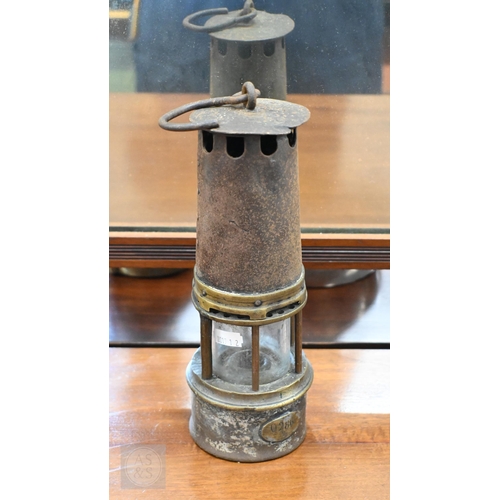 460 - An antique brass and tin miner's safety lamp (unnamed)