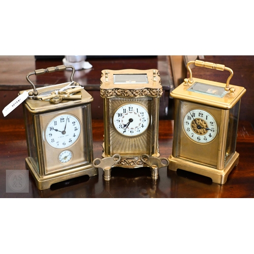 468 - Three brass carriage clocks with enamel dials to/w keys