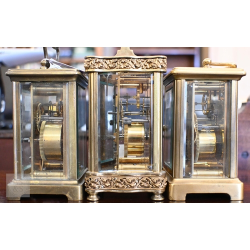 468 - Three brass carriage clocks with enamel dials to/w keys