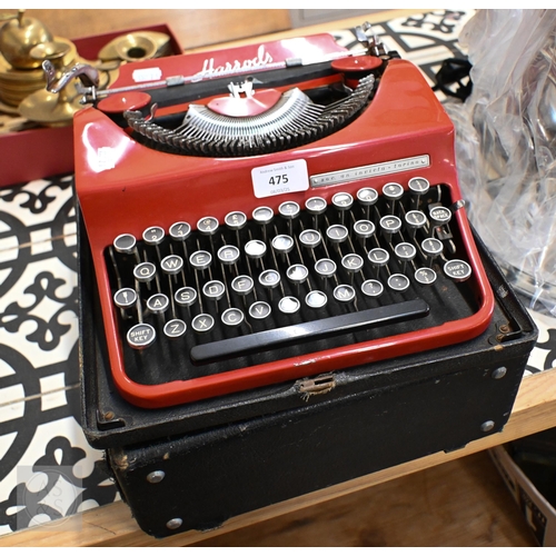 475 - A Harrods-retailed Invicta (Turin) red enamelled portable typewriter, boxed