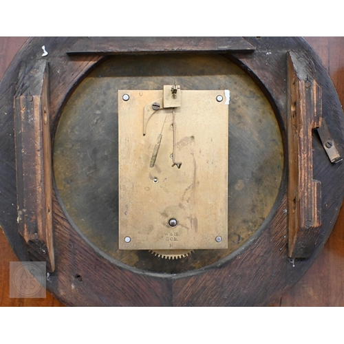 479 - An oak wall clock with 18 cm enamel dial and German movement, by Camerer Kuss & Co, London