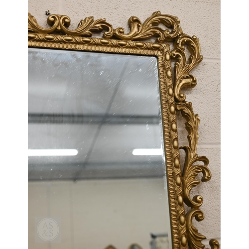 60 - A Florentine style gilt framed mirror with bevelled glass, 100 x 74 cm