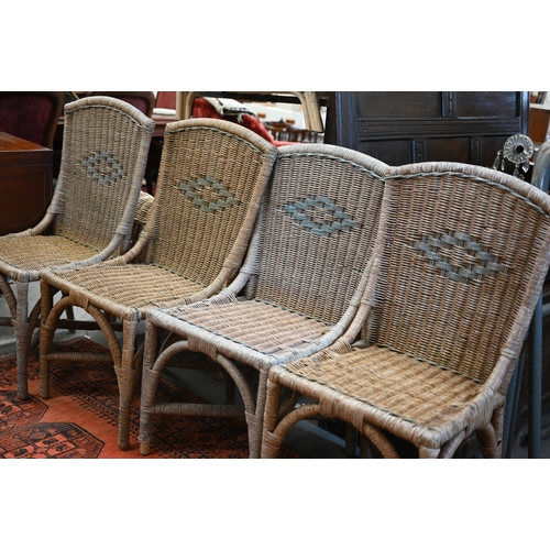 63 - Wicker three-piece conservatory suite (sofa and two armchairs) to/w four other wicker side chairs