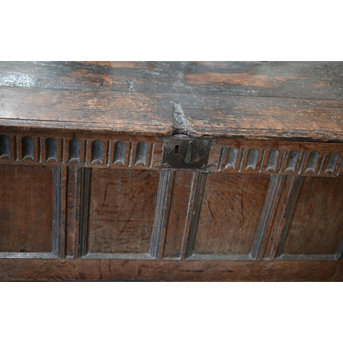 66 - An 18th century and later panelled oak coffer, 110 cm w x 46 cm d x 55 cm h