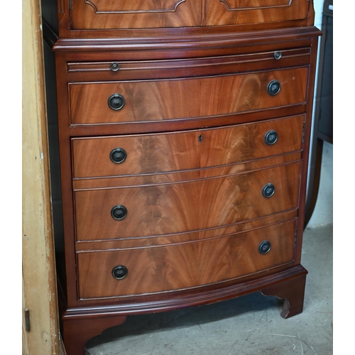 70 - A reproduction bowfront mahogany tall boy drinks cabinet, 62 cm w x 44 cm d x 130 cm h c/w two keys