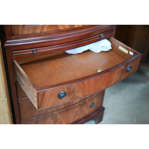 70 - A reproduction bowfront mahogany tall boy drinks cabinet, 62 cm w x 44 cm d x 130 cm h c/w two keys