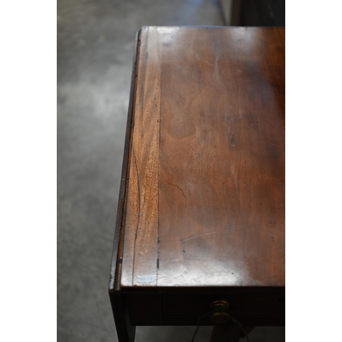 72 - A Regency mahogany sofa table with two drawers and quadraform base with turned pillars and out-swept... 