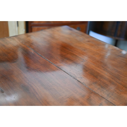 72 - A Regency mahogany sofa table with two drawers and quadraform base with turned pillars and out-swept... 