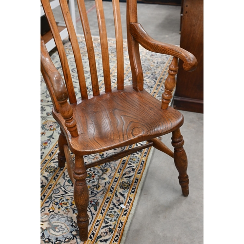 73 - A vintage ash and elm lath back Windsor chair with turned legs and stretchers