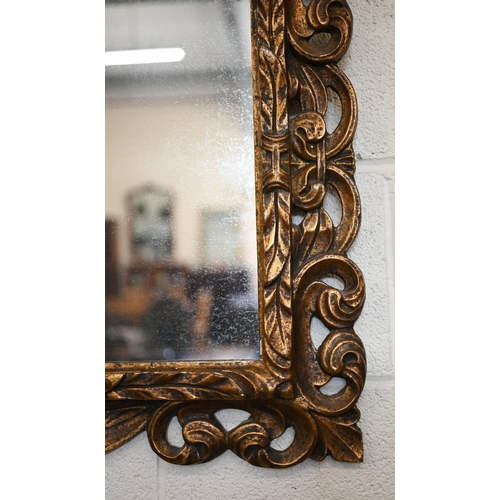 79 - A Florentine gilt framed wall mirror, 80 cm w x 60 cm h