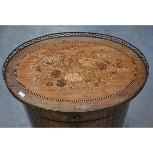 95 - A French kingwood and floral marquetry three drawer side table with pierced brass galleries on the t... 