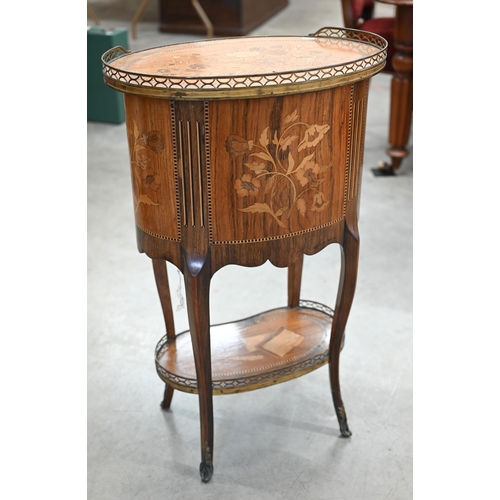 95 - A French kingwood and floral marquetry three drawer side table with pierced brass galleries on the t... 