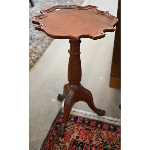 126 - Two similar Georgian style occasional tables in the manner of Chippendale, with scalloped tops and c... 