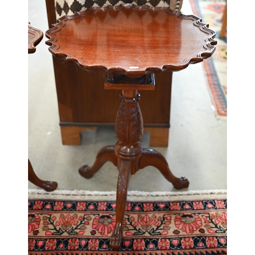 126 - Two similar Georgian style occasional tables in the manner of Chippendale, with scalloped tops and c... 