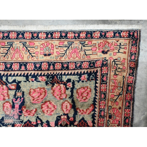 224 - Persian Afshar rug, floral design on dark blue ground palmette border, 177 x 124 cm