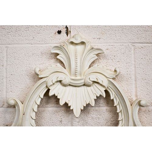 284 - A large Chippendale style painted over mantel mirror with scrolling foliate open frame, 260 x 145 cm... 