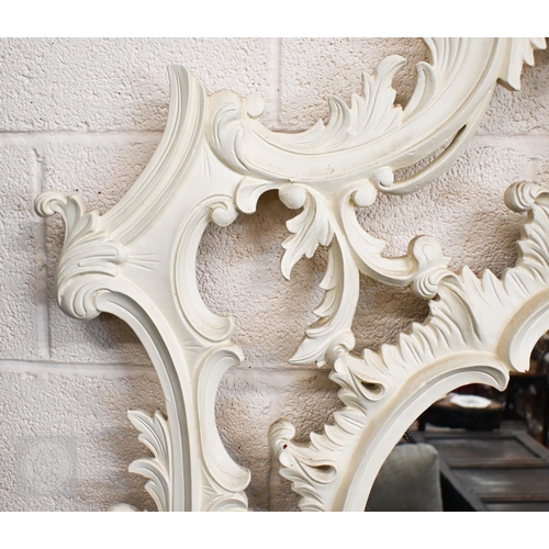 284 - A large Chippendale style painted over mantel mirror with scrolling foliate open frame, 260 x 145 cm... 