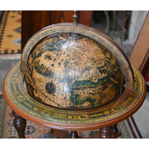 290 - A vintage hardwood globe drinks cabinet with half hinged top enclosing fitted interior