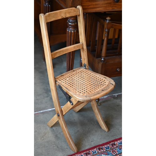 57 - Reproduction mahogany four-division Canterbury on turned legs, to/w a child's chair (2)