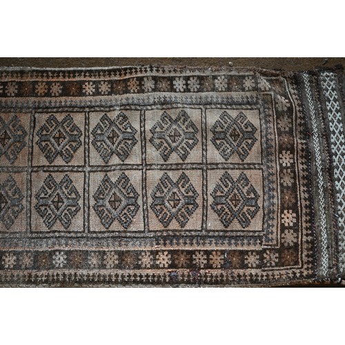 297 - Antique Balouch saddle bag, geometric design in brown hues, 115 x 56 cm