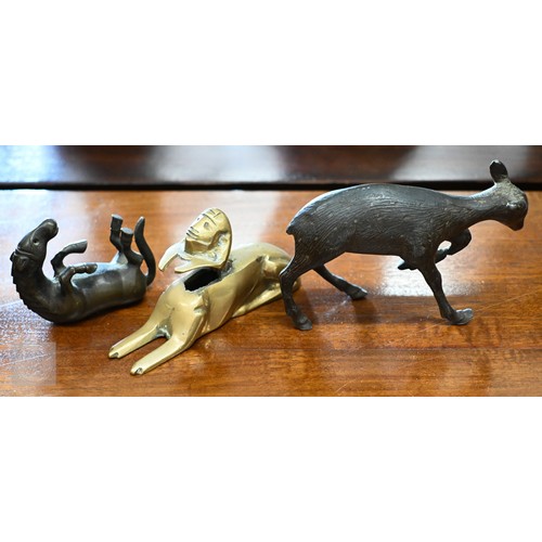 457 - Two bronze dogs - one stamped for M. Kirmse, Gorham Co., to/w a bronzed rolling horse, a faun and a ... 