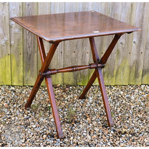 142 - An antique mahogany coaching table on folding base top, 75 x 60 cm