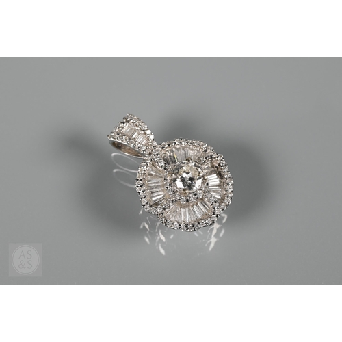 A diamond pendant set with approx 0.75 carat central stone surrounded by sunburst baguette diamonds and tiny diamond-set bezel, white metal set stamped 750 18k, approx 5.1g all in, 1.5 cm diam