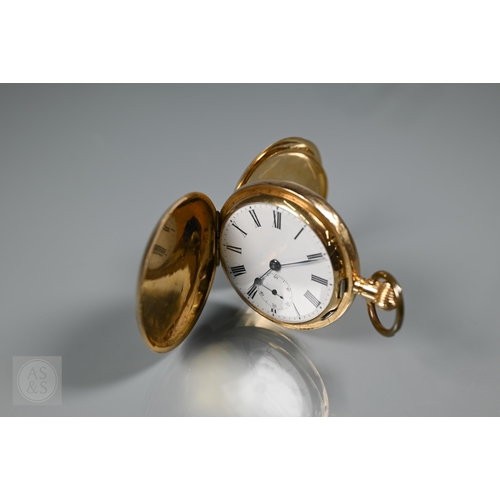 An 18K gold keyless full hunter minute repeat pocket watch, the white enamel dial with roman numerals and secondary seconds, striking on twin hammers and gongs, approx. 98g all-in, face diam 4 cm, closed 5.5 cm