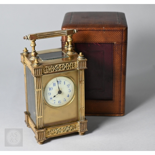 668 - A French brass five window carriage clock, with gothic revival style relief cast panels, the circula... 