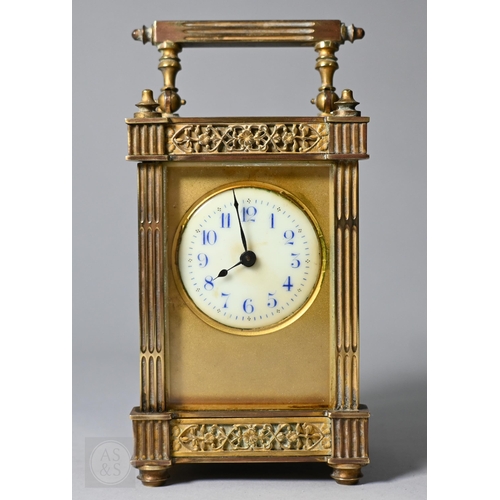 668 - A French brass five window carriage clock, with gothic revival style relief cast panels, the circula... 