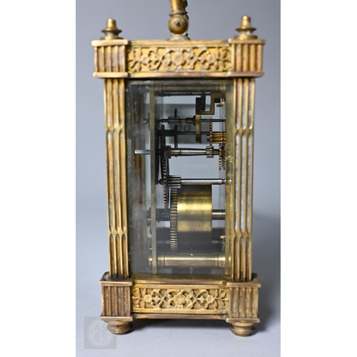 668 - A French brass five window carriage clock, with gothic revival style relief cast panels, the circula... 
