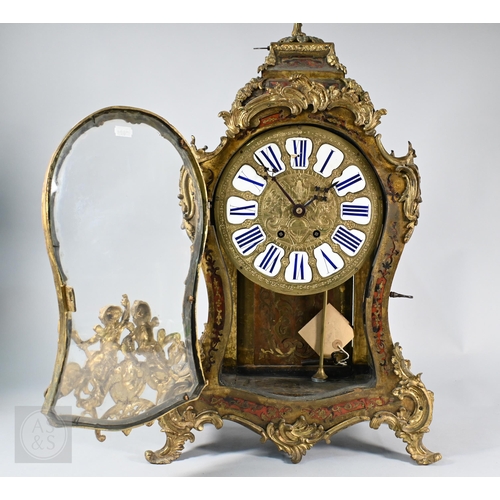 670A - A Louis XV French boulle work bracket clock, the brass inlaid tortoiseshell case surmounted by a hor... 