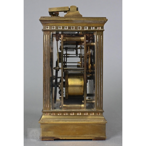 671 - A late 19th century brass cased twin train repeating movement carriage clock, striking the hours and... 