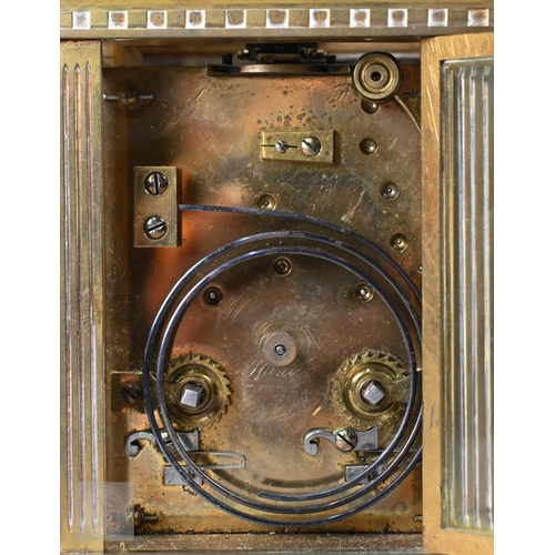 671 - A late 19th century brass cased twin train repeating movement carriage clock, striking the hours and... 