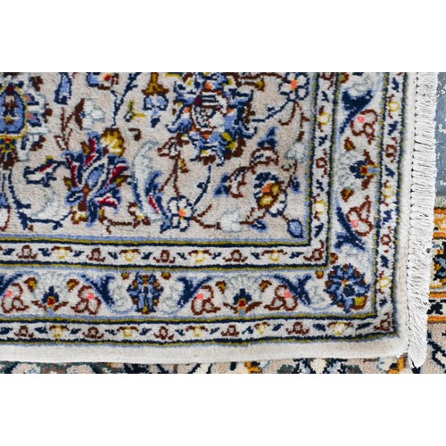 635 - A Central Persian Kashan carpet, cream ground with traditional floral design, 340 x 250 cm