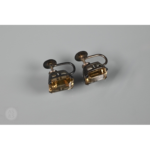 538 - Two loose brown citrine stones, one oval 2 x 1.5 cm, one rectangular 2.2 x 1.8 cm, a pair of pale br... 