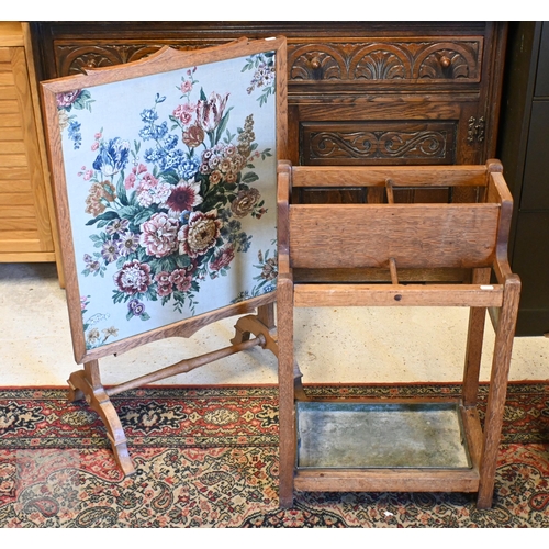 252 - #An early 20th century four division stick stand with metal tray, 46 x 28 x 70 cm high to/w oak fram... 