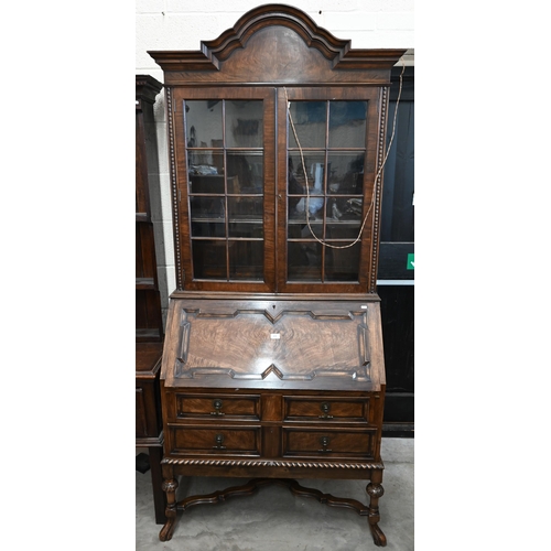 272 - A 17th century style mahogany and walnut bureau bookcase, astragal glazed doors over the fall front ... 