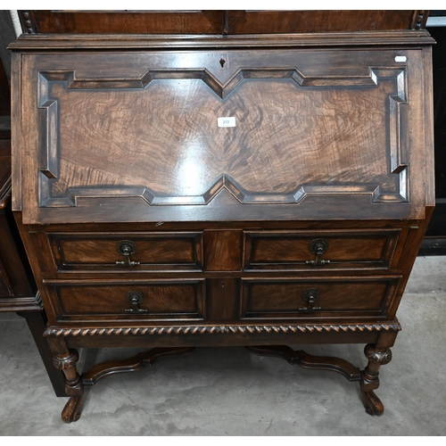 272 - A 17th century style mahogany and walnut bureau bookcase, astragal glazed doors over the fall front ... 