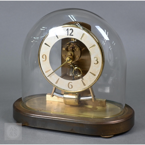 373 - A Kundo Electronic mantel clock under dome, 23 cm high