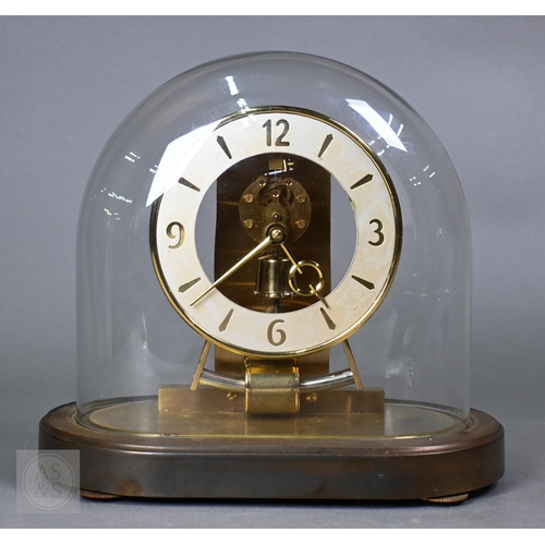 373 - A Kundo Electronic mantel clock under dome, 23 cm high
