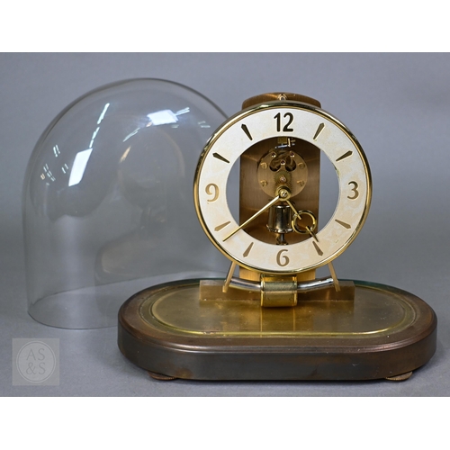 373 - A Kundo Electronic mantel clock under dome, 23 cm high
